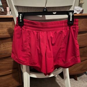 - Red Luluemon Hotty Hot low rise 4” shorts